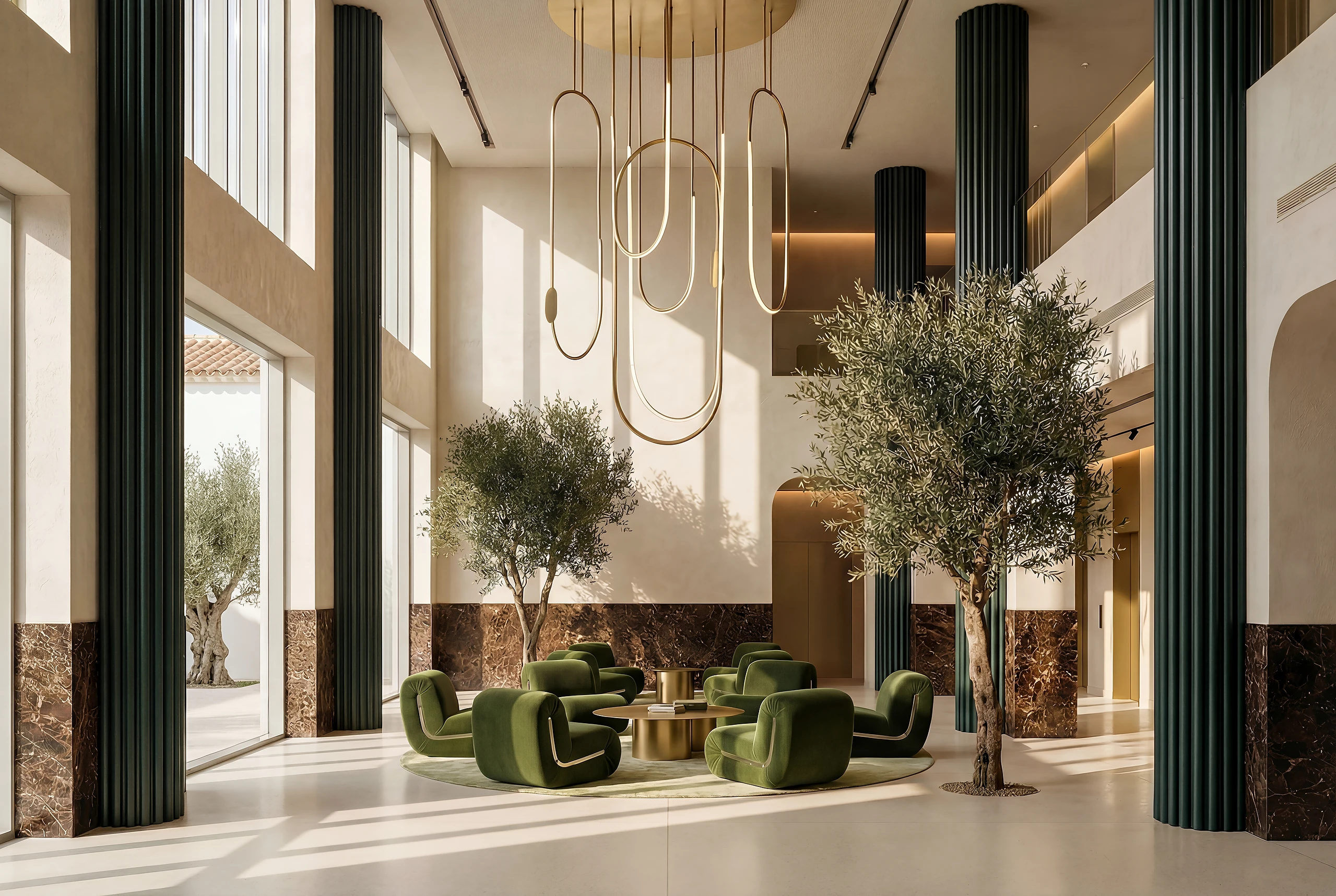 Hotel lobby with olive trees, dark timber screens and a stone floor